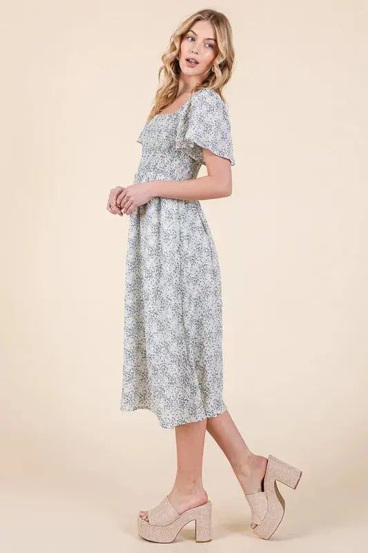 Step Into Spring: Smocked Floral Print Flutter Sleeve Midi Dress for Effortless Garden Party Style Jewelry Bubble
