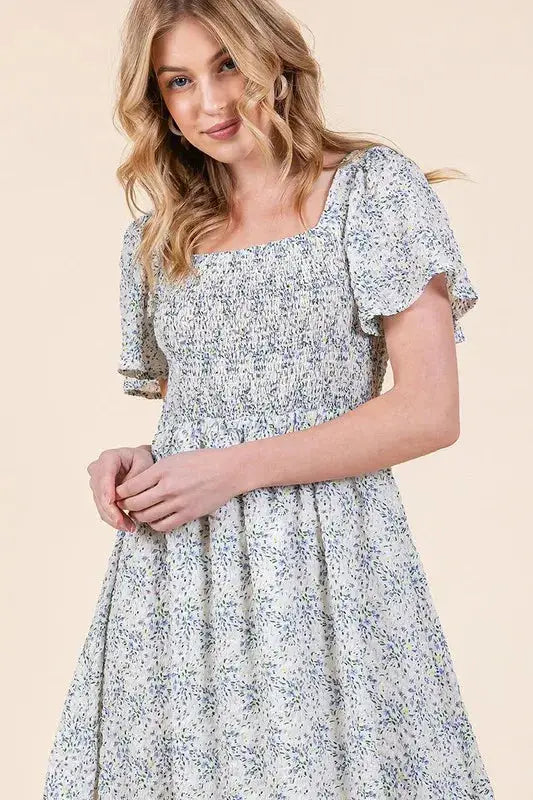 Step Into Spring: Smocked Floral Print Flutter Sleeve Midi Dress for Effortless Garden Party Style Jewelry Bubble
