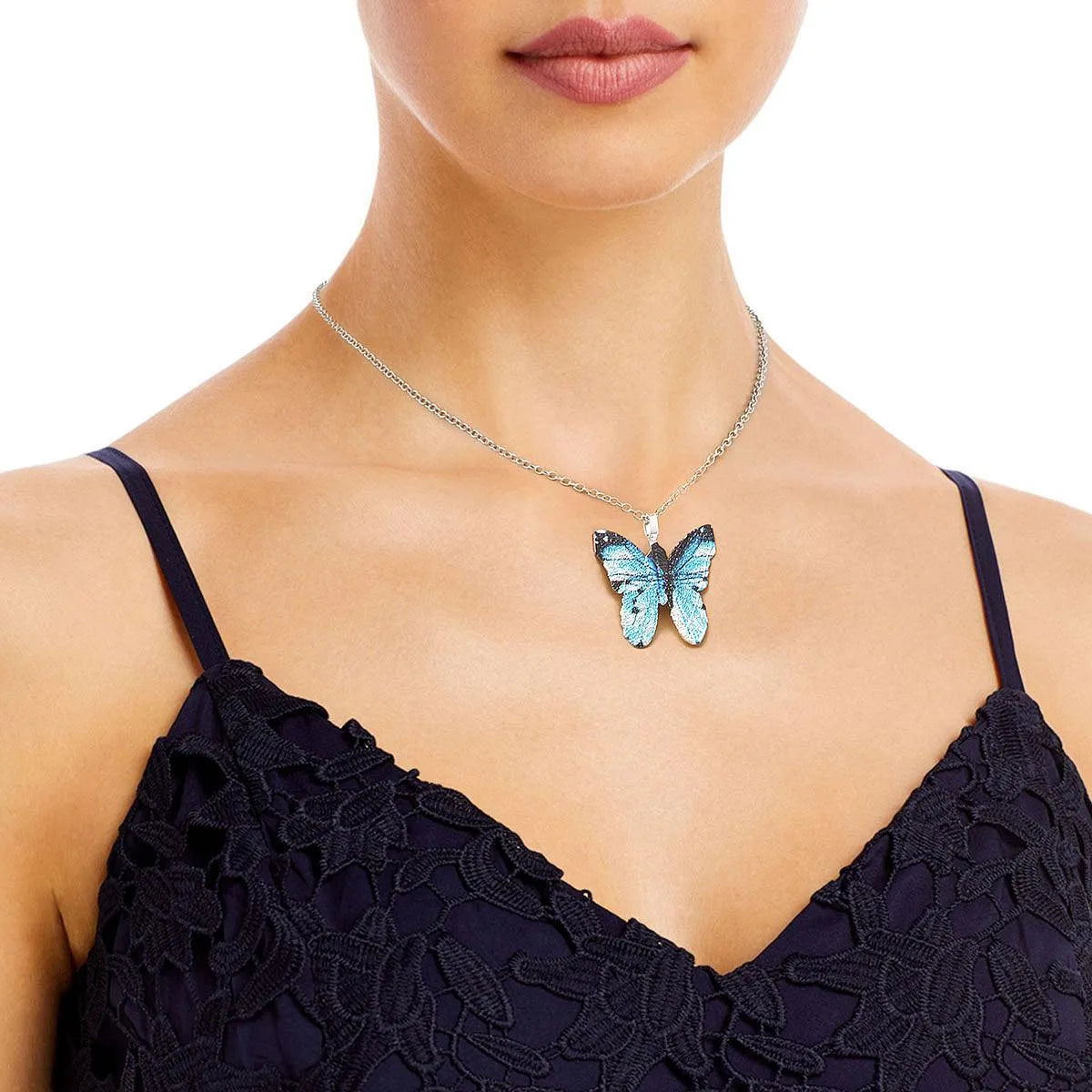 Get ready to flutter with our Blue Butterfly Necklace Pinktown