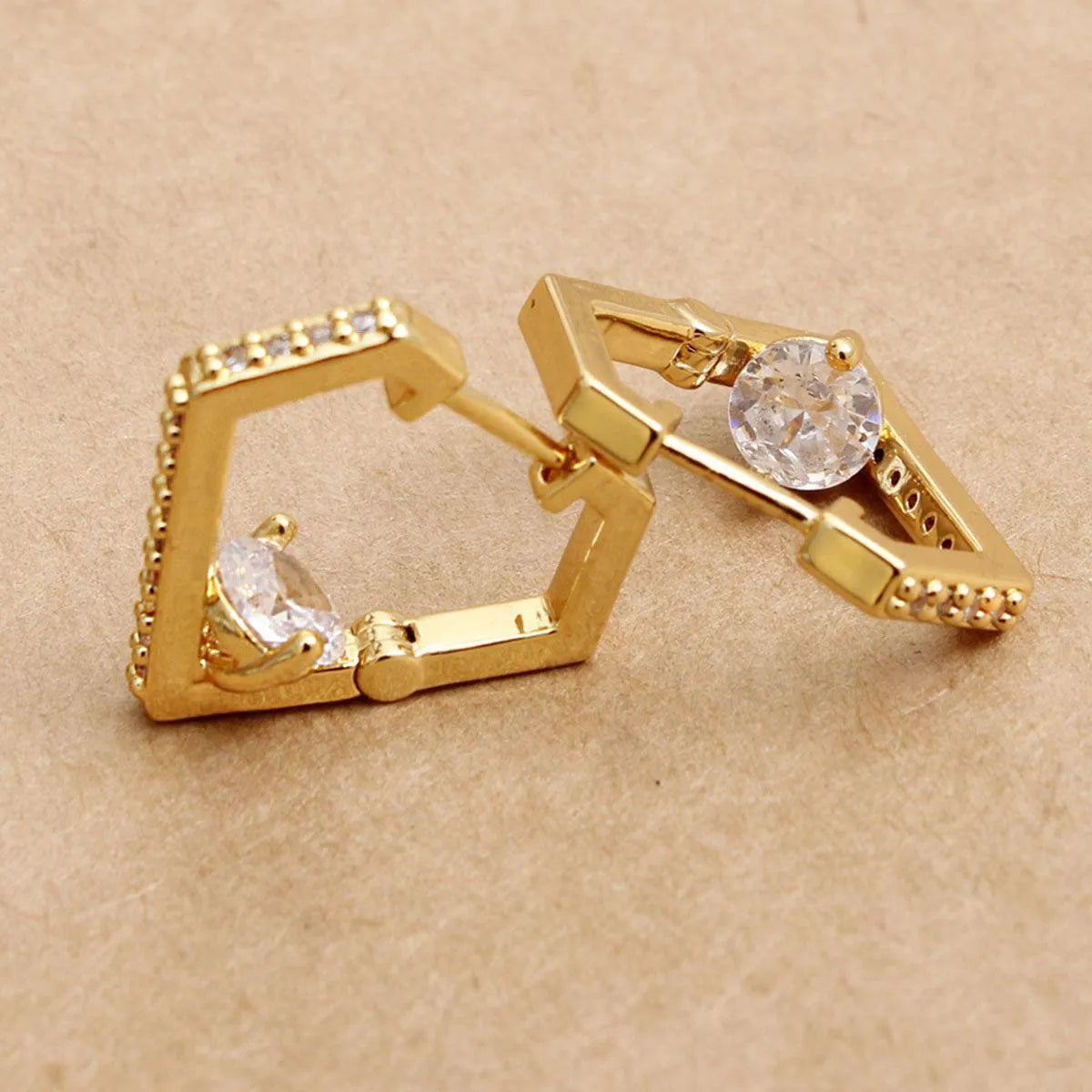 Shine in Style: Stunning CZ Diamond Design Huggie Hoops with Gold Finish Pinktown