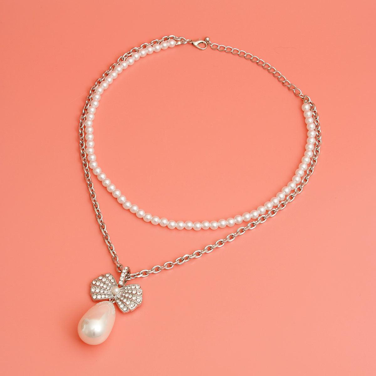 Elegant Silver Bow & Pearl Drop Pendant Necklace: Timeless Elegance for Every Occasion