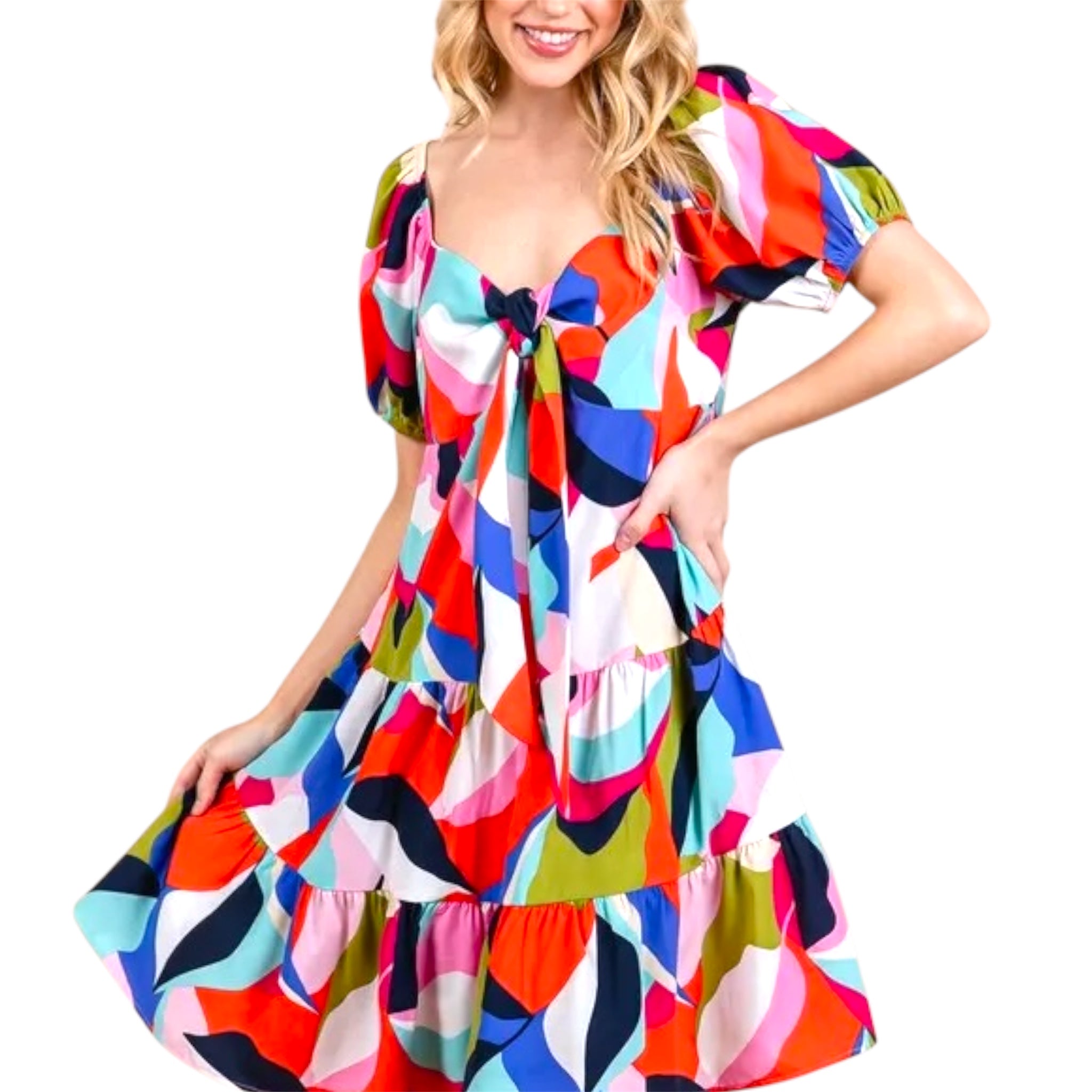 Woman wearing a colorful abstract print tiered midi dress with short puff sleeves and front tie detail – Jewelry Bubble dress collection hero image