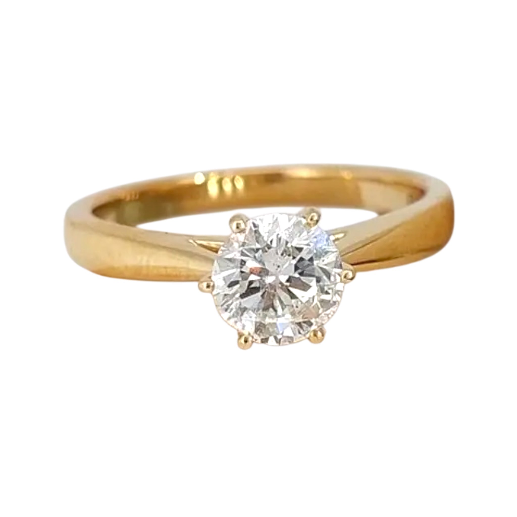 Classic solitaire engagement ring with round brilliant-cut diamond set in yellow gold band – Jewelry Bubble rings collection hero image