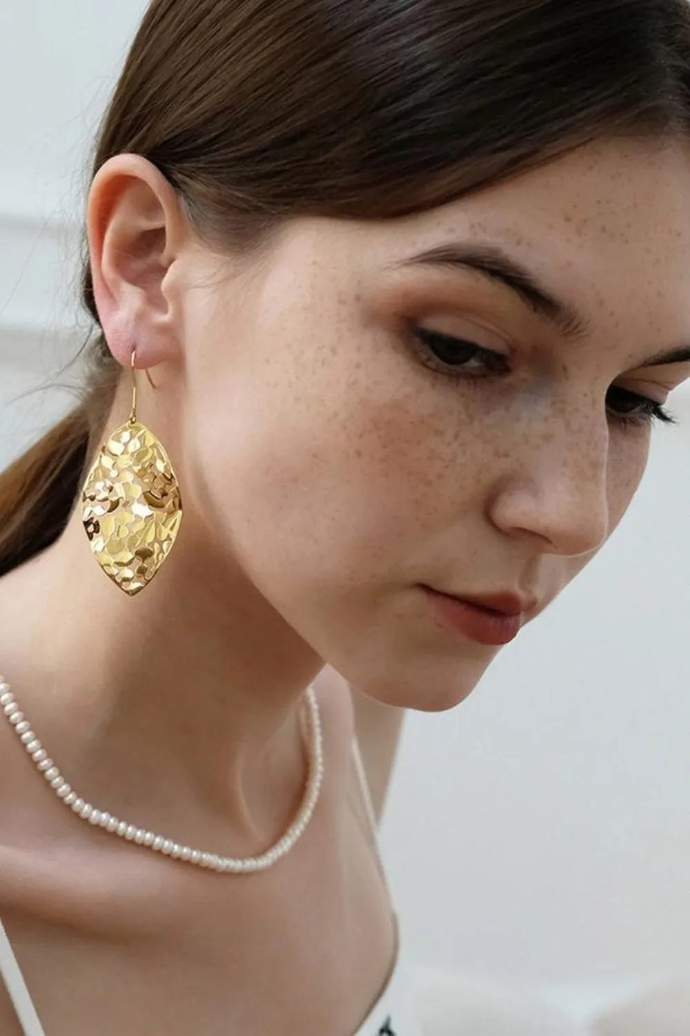 Gold-Plated Leaf Dangle Earrings - Intricate Cutout Design
