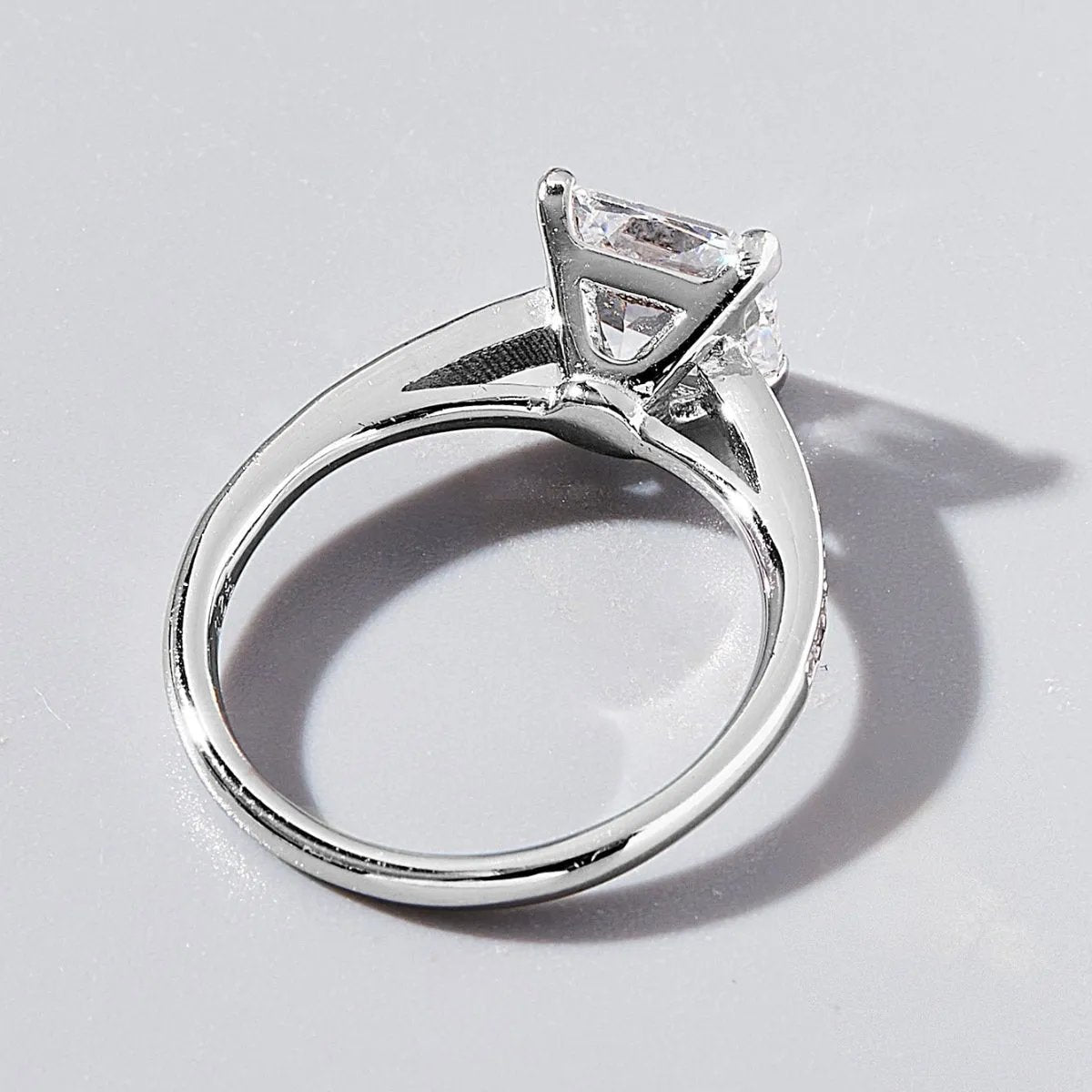 Platinum-Plated Zircon Solitaire Ring - Elegant Sterling Silver