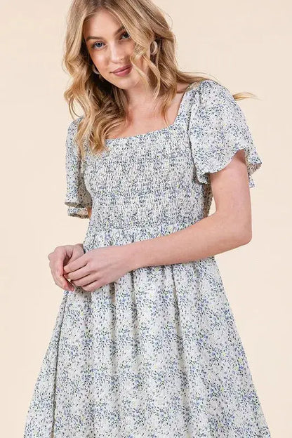 Step Into Spring: Smocked Floral Print Flutter Sleeve Midi Dress for Effortless Garden Party Style Jewelry Bubble