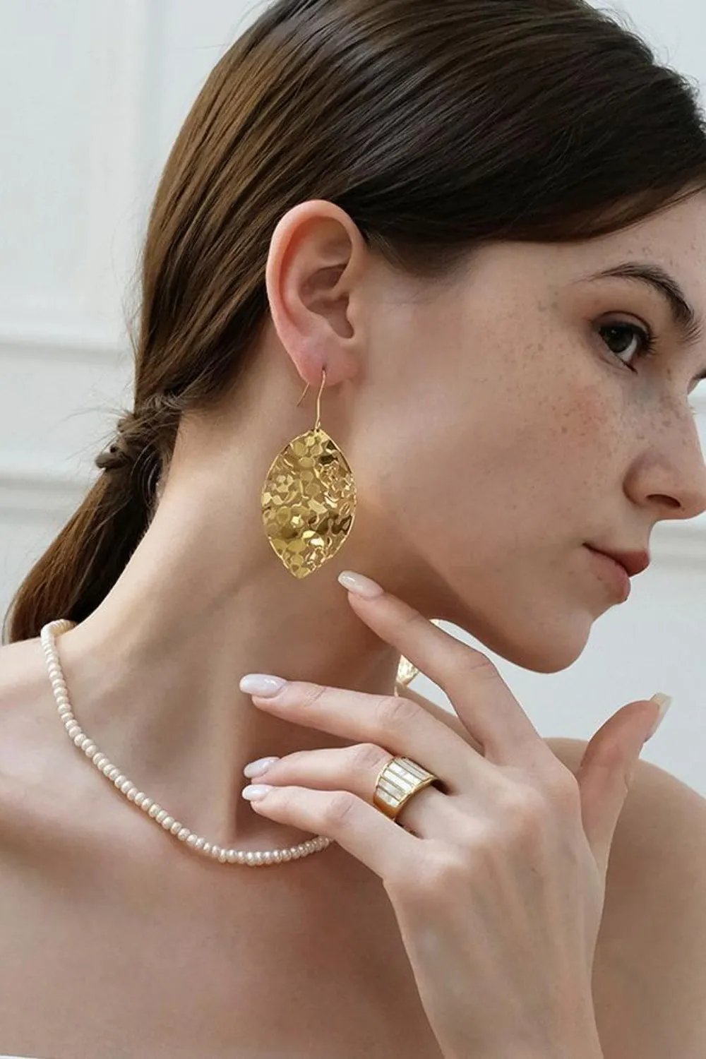 Gold-Plated Leaf Dangle Earrings - Intricate Cutout Design