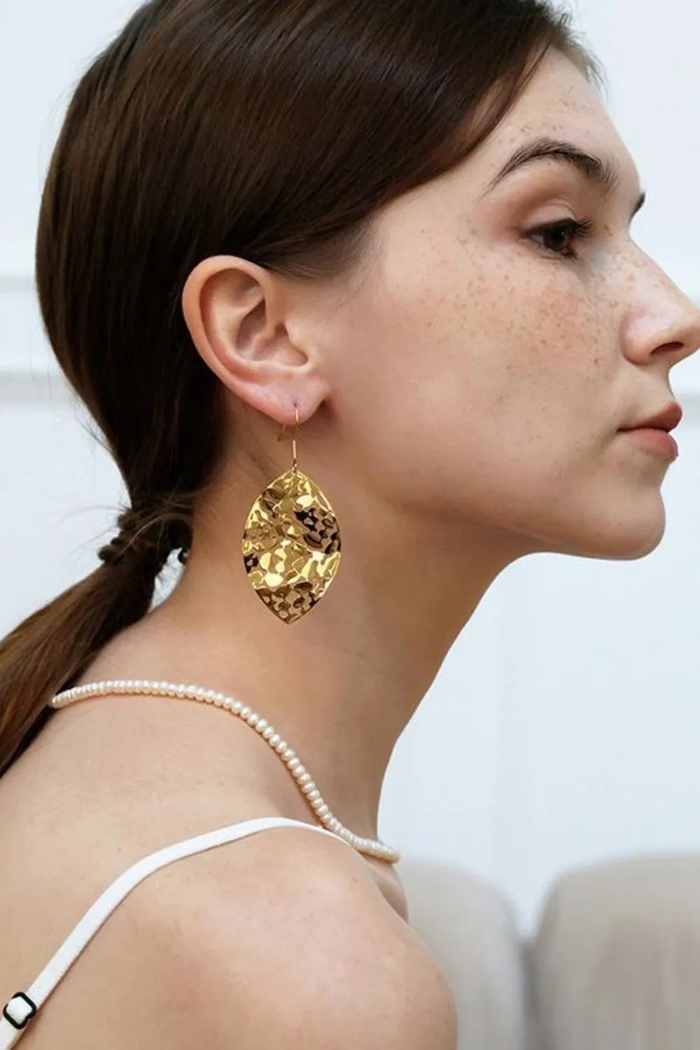 Gold-Plated Leaf Dangle Earrings - Intricate Cutout Design