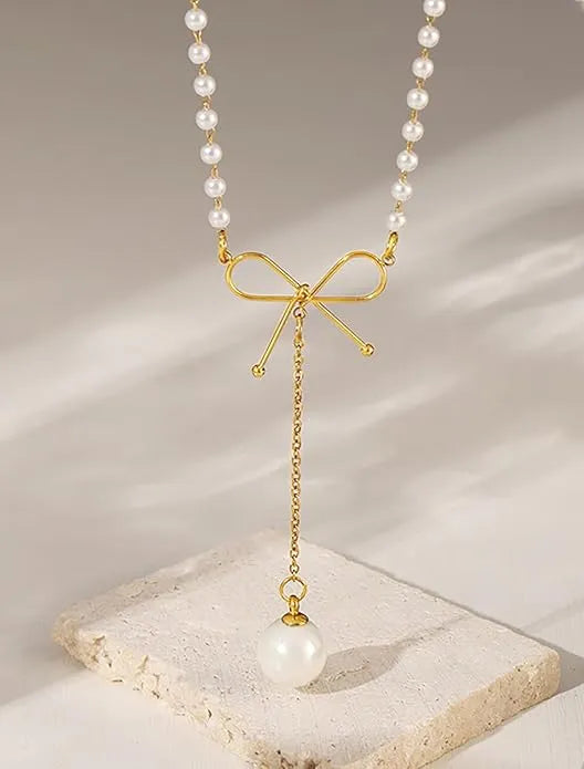 Graceful Bow Necklace with Faux Pearl Accent Jewelry Bubble