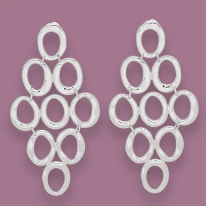 Redefine Style: Open Oval Cascade Earrings in Silver Tone