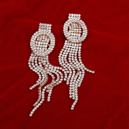 Luxe Clear Rhinestone Oval Buckle Fringe Gold Tone Earrings – Bold Drop Tassel Style for Glamorous Occasions Jewelry Bubble