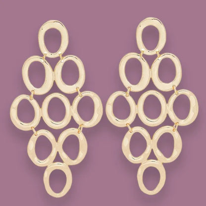 Redefine Style: Open Oval Cascade Earrings in Gold Tone Jewelry Bubble