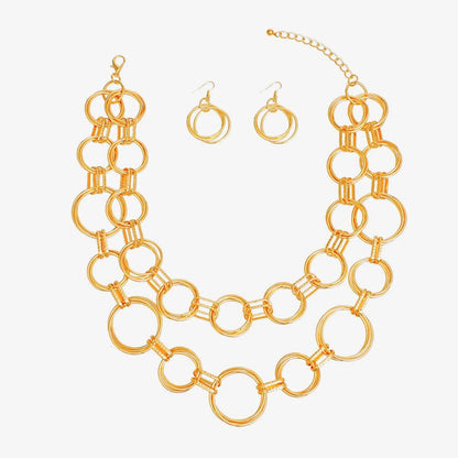 Style a Simple Outfit with a Gold Linked Rings Chain Set - Timeless Chic Jewelry Bubble