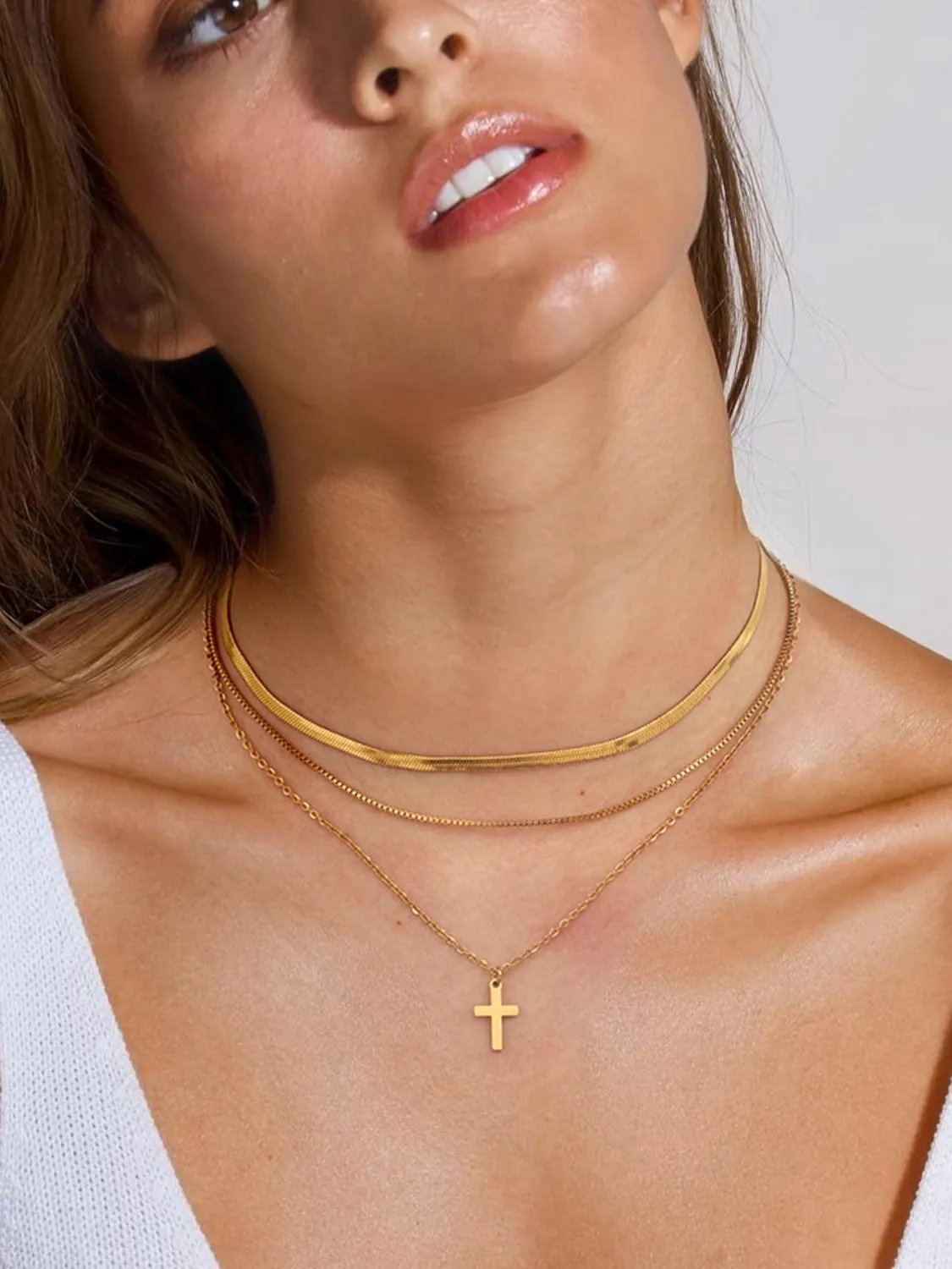 Triple Chain Cross Necklace: A Layered Statement of Faith and Style