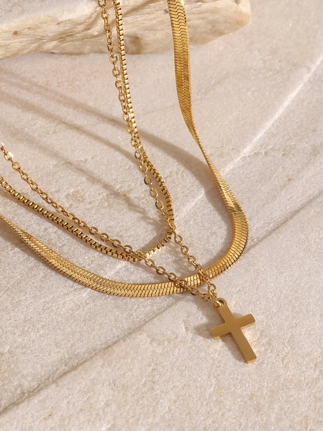 Triple Chain Cross Necklace: A Layered Statement of Faith and Style