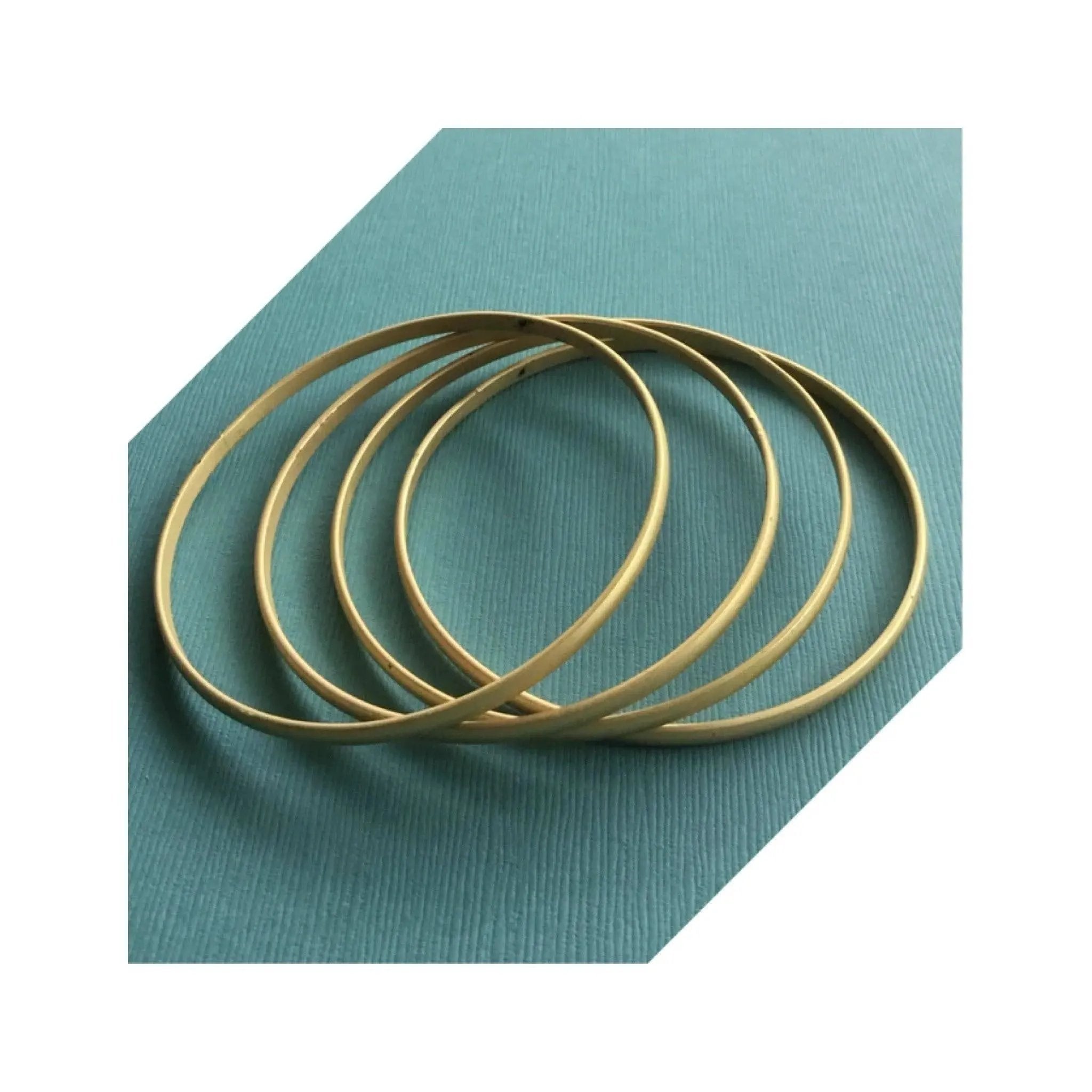 Truly eye-catching vintage stack bangles dangle peace charms