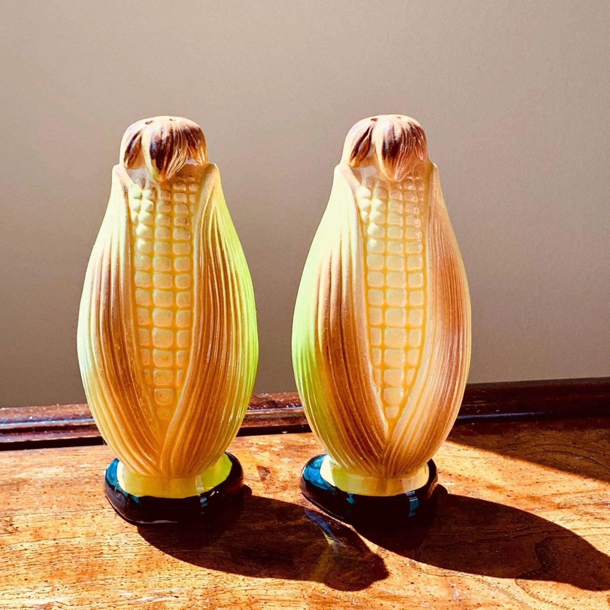 Vintage Ceramic Shakers Corn Cobs with Faces and Black Shoes