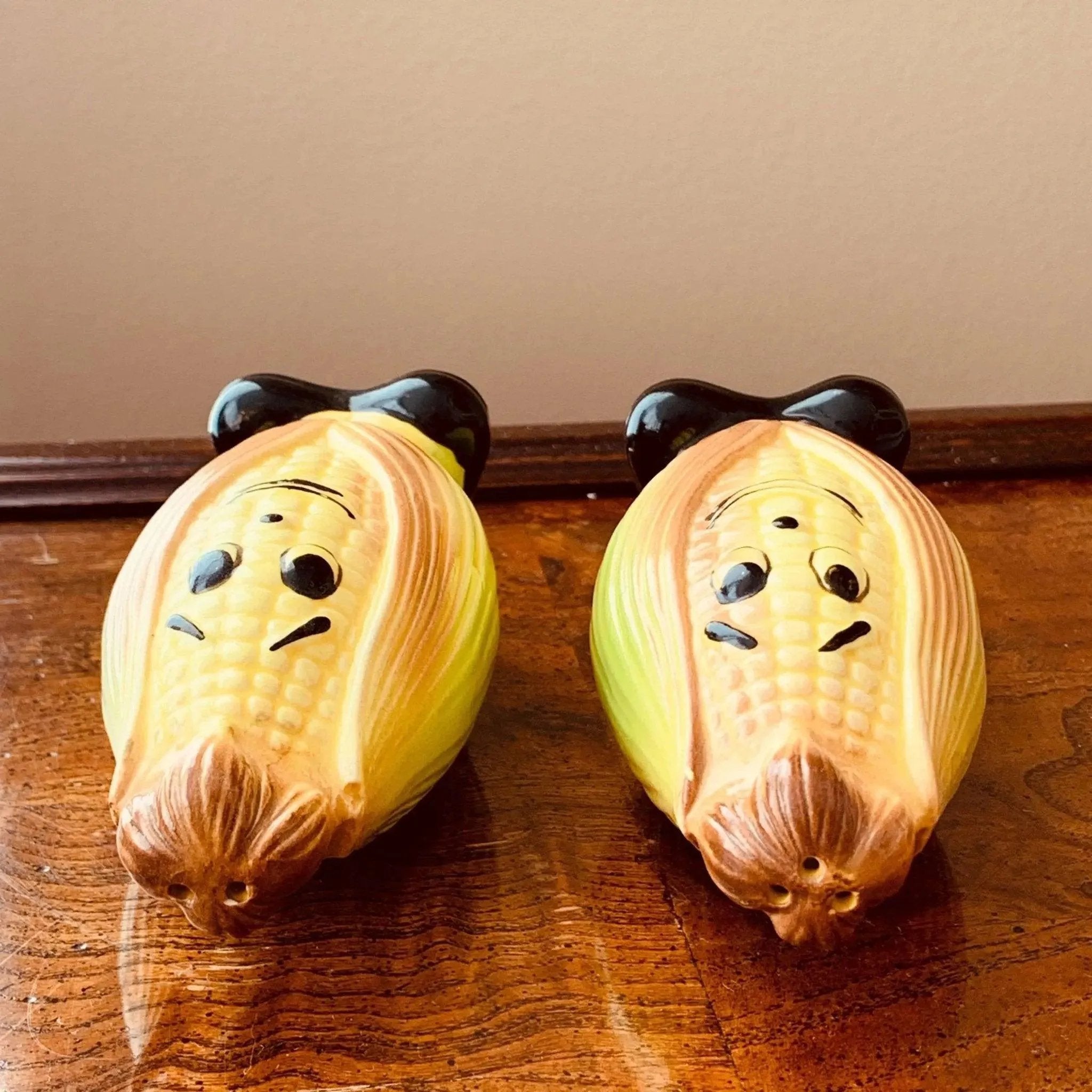 Vintage Ceramic Shakers Corn Cobs with Faces and Black Shoes