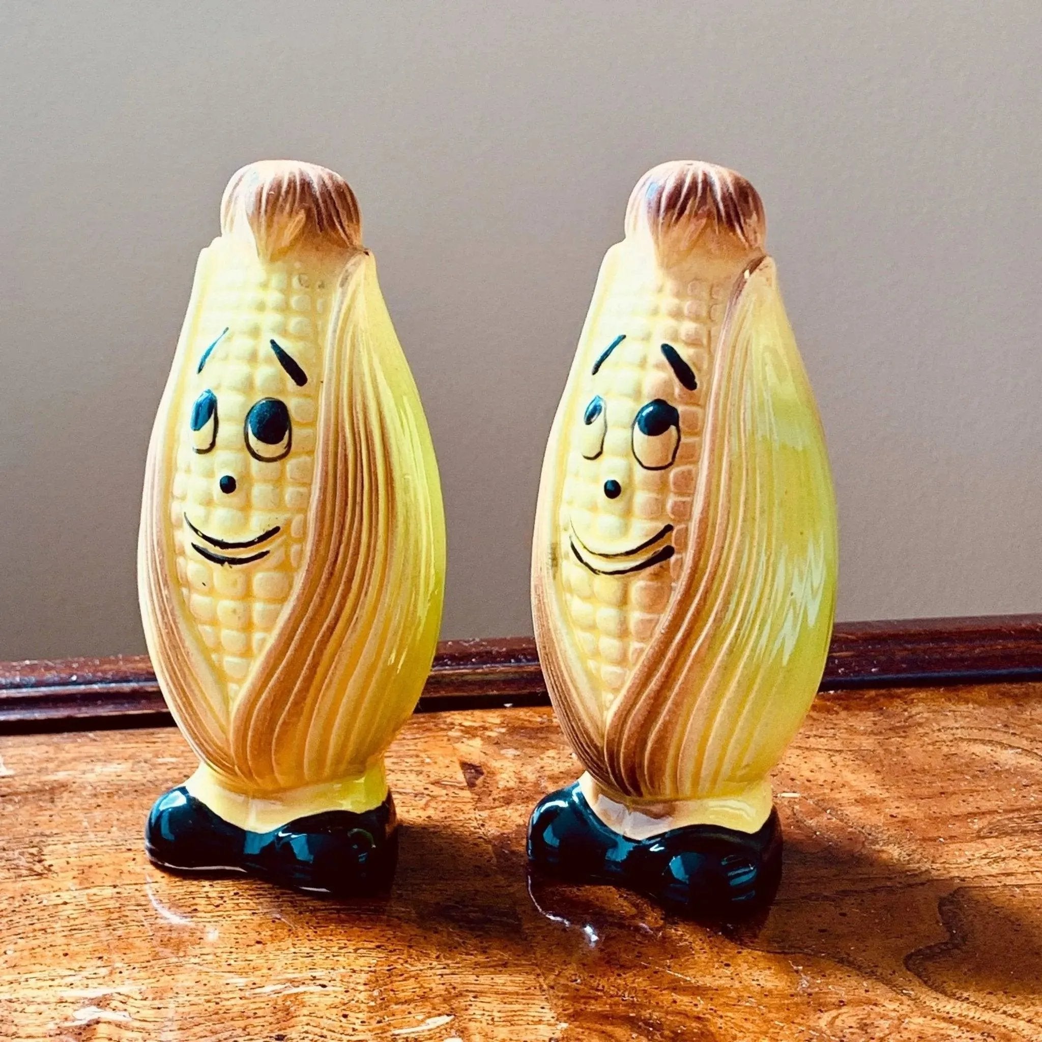 Vintage Ceramic Shakers Corn Cobs with Faces and Black Shoes