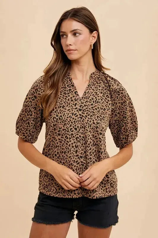 Animal Print Knit Volume Sleeve Blouse – Trendy Statement Piece with Buttoned Detail