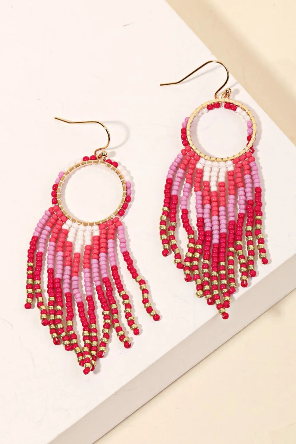 Bold Bohemian Style: Circle Cutout Fuchsia Fringe Earrings