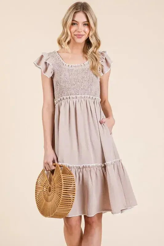 Make a Statement: Ruffle Trim Smocked Dress with Contrast Design in Taupe Color