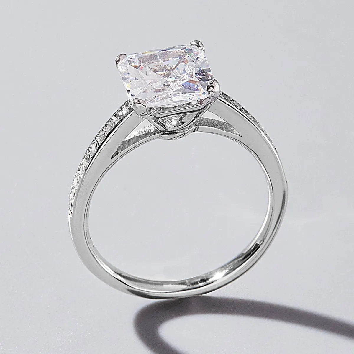 Platinum-Plated Zircon Solitaire Ring - Elegant Sterling Silver