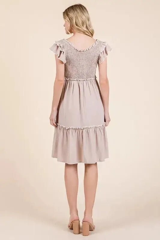 Make a Statement: Ruffle Trim Smocked Dress with Contrast Design in Taupe Color