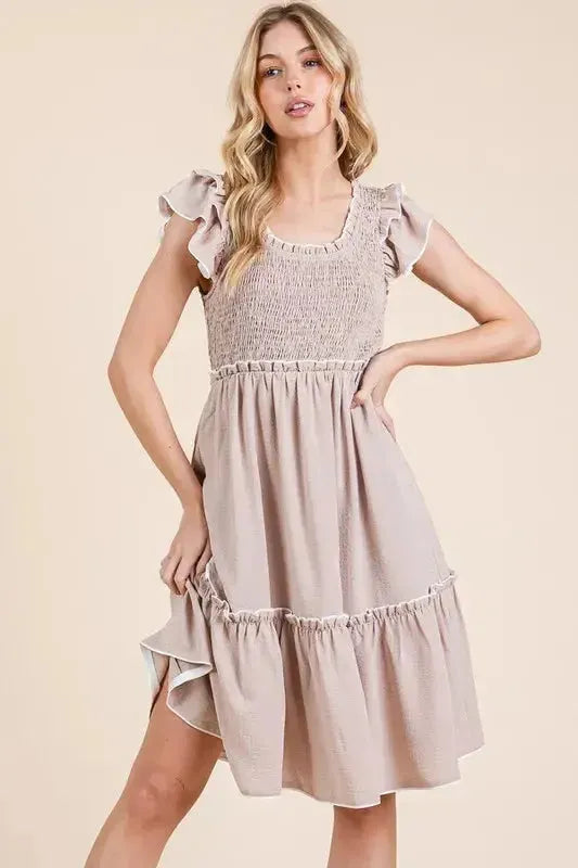 Make a Statement: Ruffle Trim Smocked Dress with Contrast Design in Taupe Color
