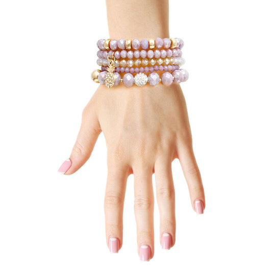 Charm Your Wrist: Purple Beaded Bracelets with Tropical Dangle