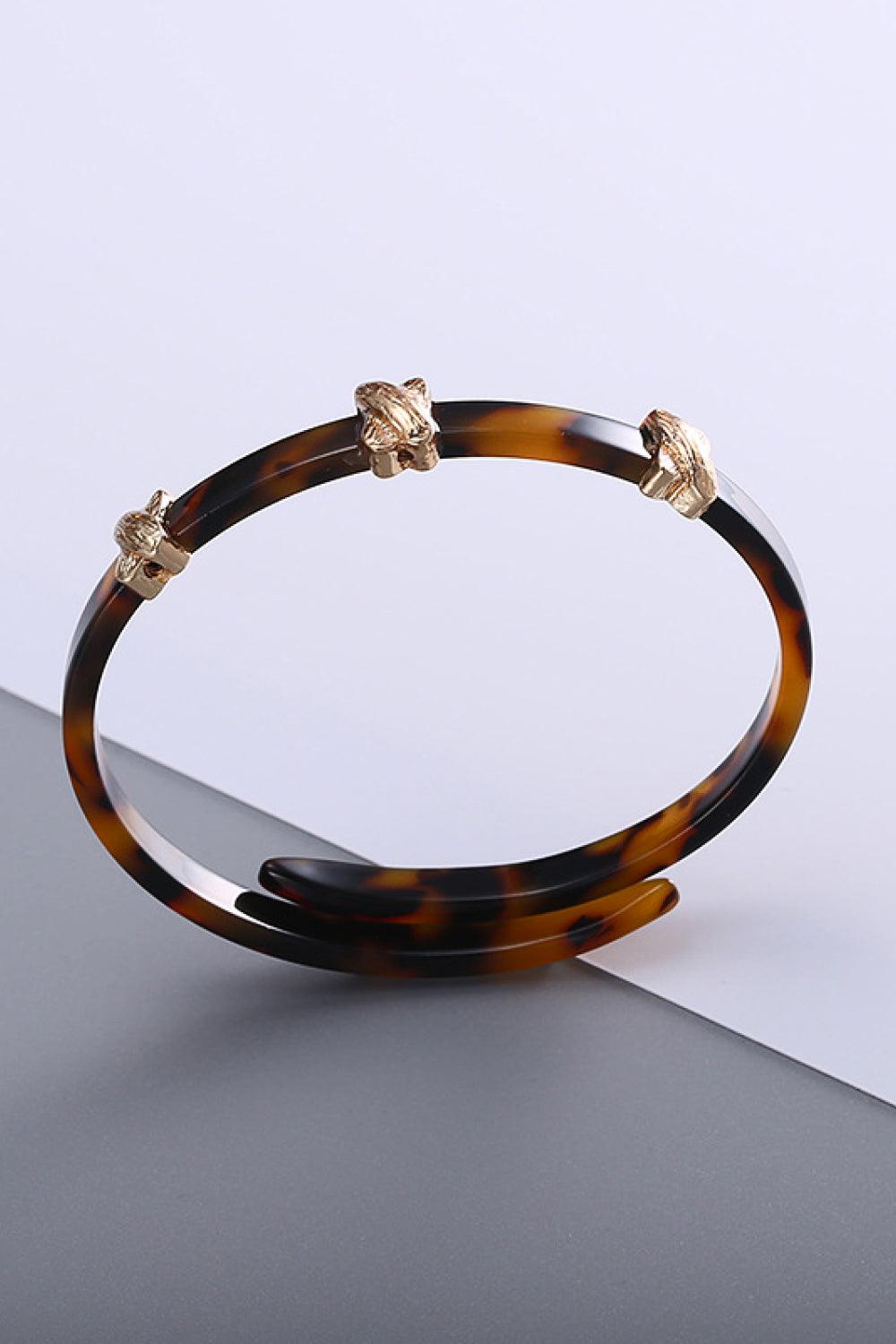 Complete Your Look with a Stylish Faux Tortoise Shell Bypass Bracelet