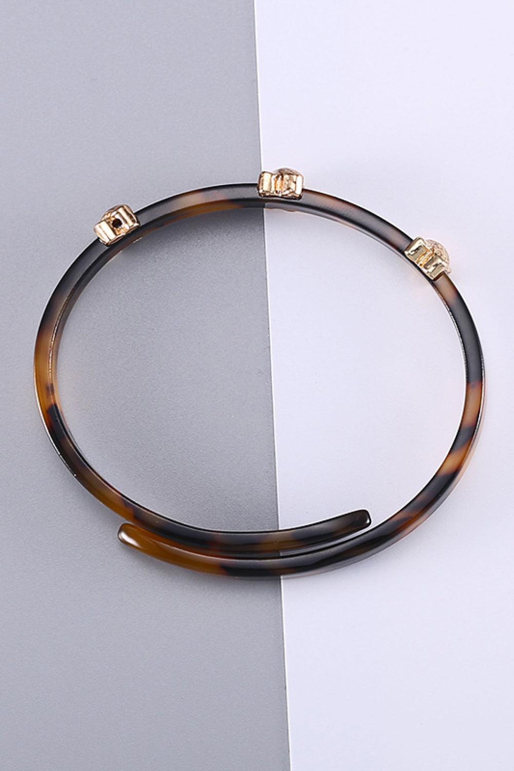 Complete Your Look with a Stylish Faux Tortoise Shell Bypass Bracelet