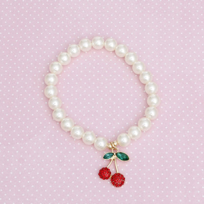 Women's Pearl Cherry Bracelet with Red Rhinestone Charm, Gold Tone, Stretch Fit Pinktown