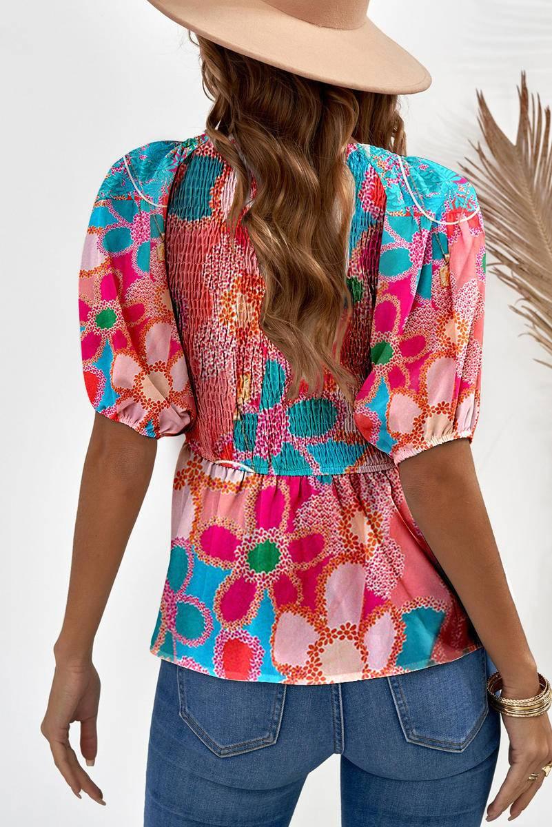 Fall in love with our Flower Print Puff Sleeve Peplum Top - Shop Now!