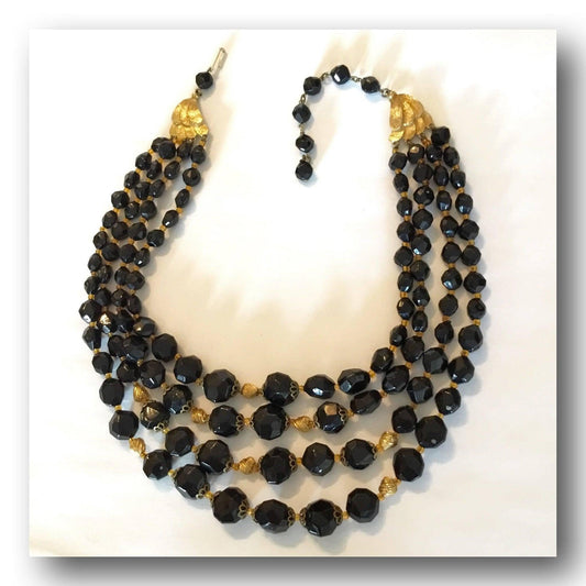Four strands faceted graduated vintage black plastic beaded necklace