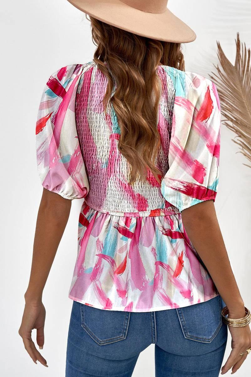 Get Noticed in this V Neck Abstract Print Top with Puff Sleeves