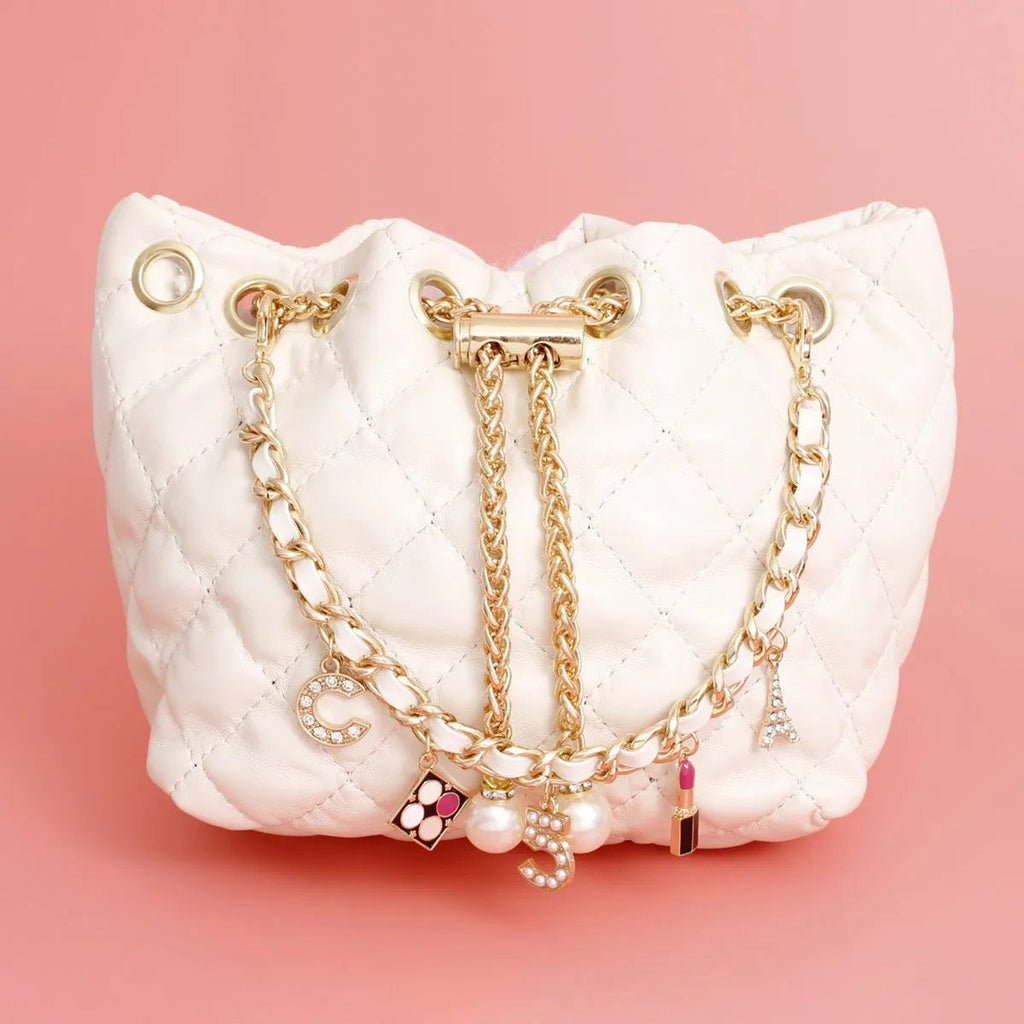 White Quilted Vegan Faux Leather Bag with Parisian-Inspired Charms