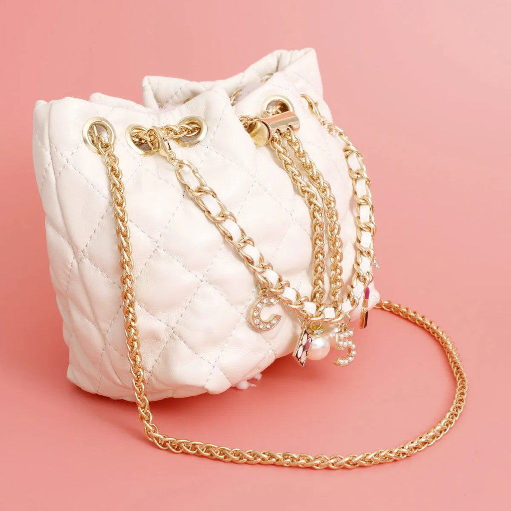 White Quilted Vegan Faux Leather Bag with Parisian-Inspired Charms