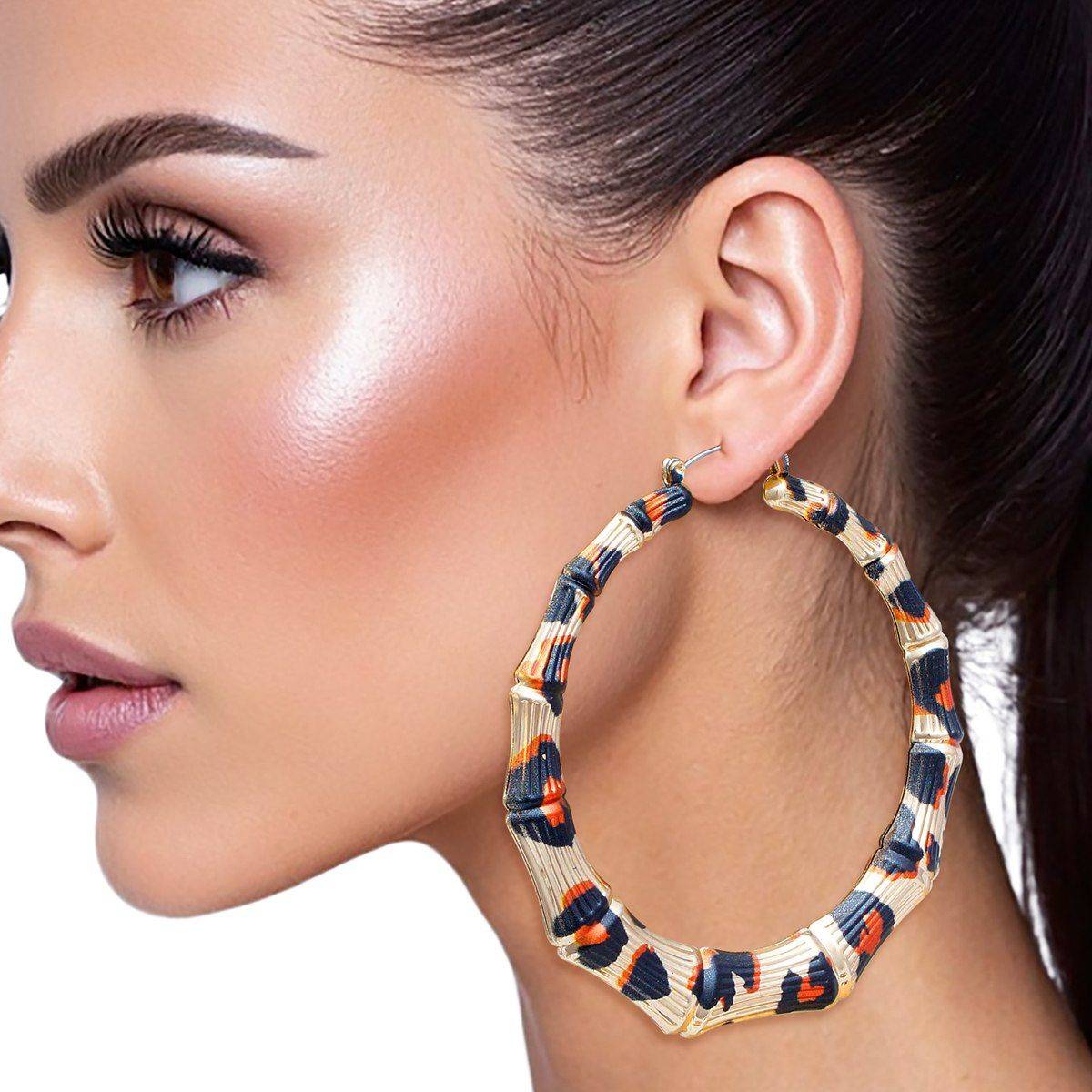 Animal Print Hoop Earrings in Gold Tone