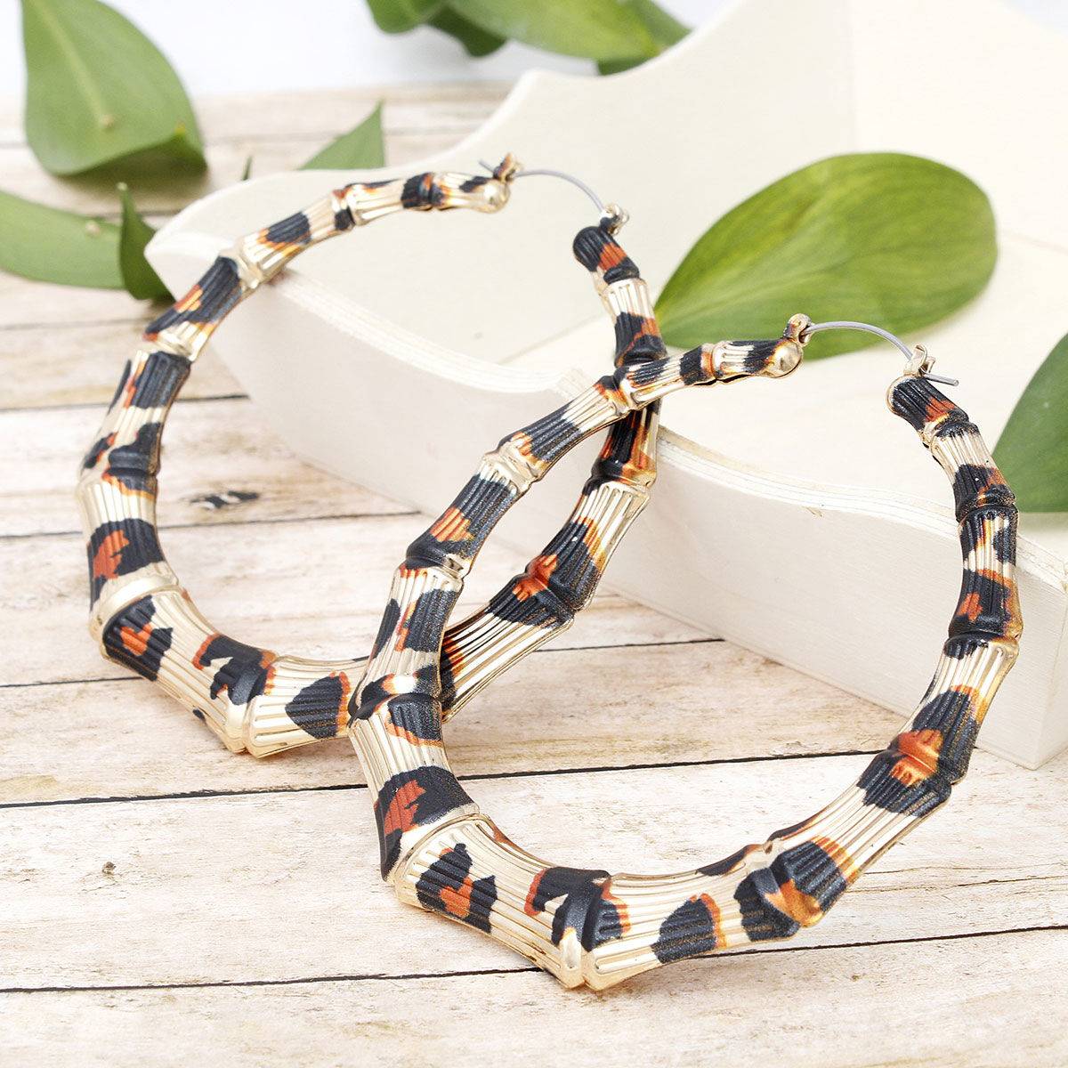 Animal Print Hoop Earrings in Gold Tone