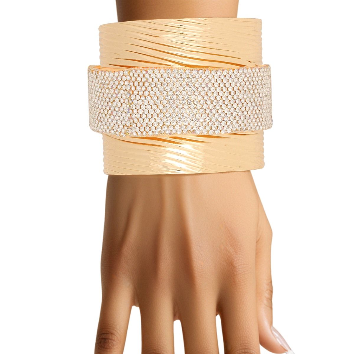 Gold ribbed cuff bracelet with clear rhinestone band