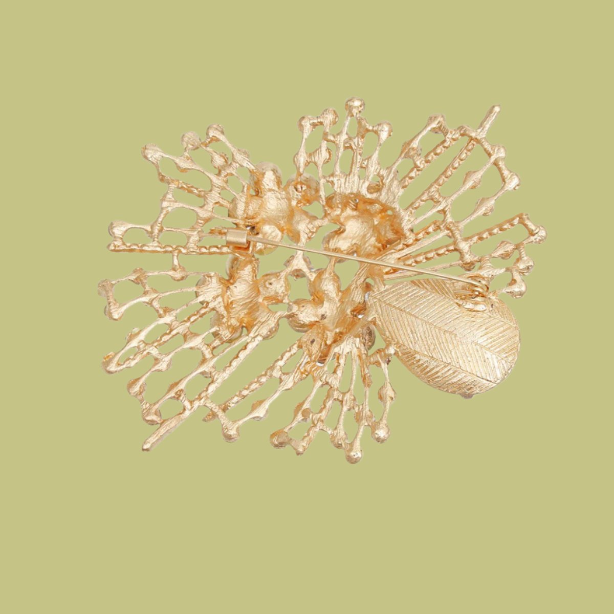 Starburst Brooch: Glow in Warm Elegance