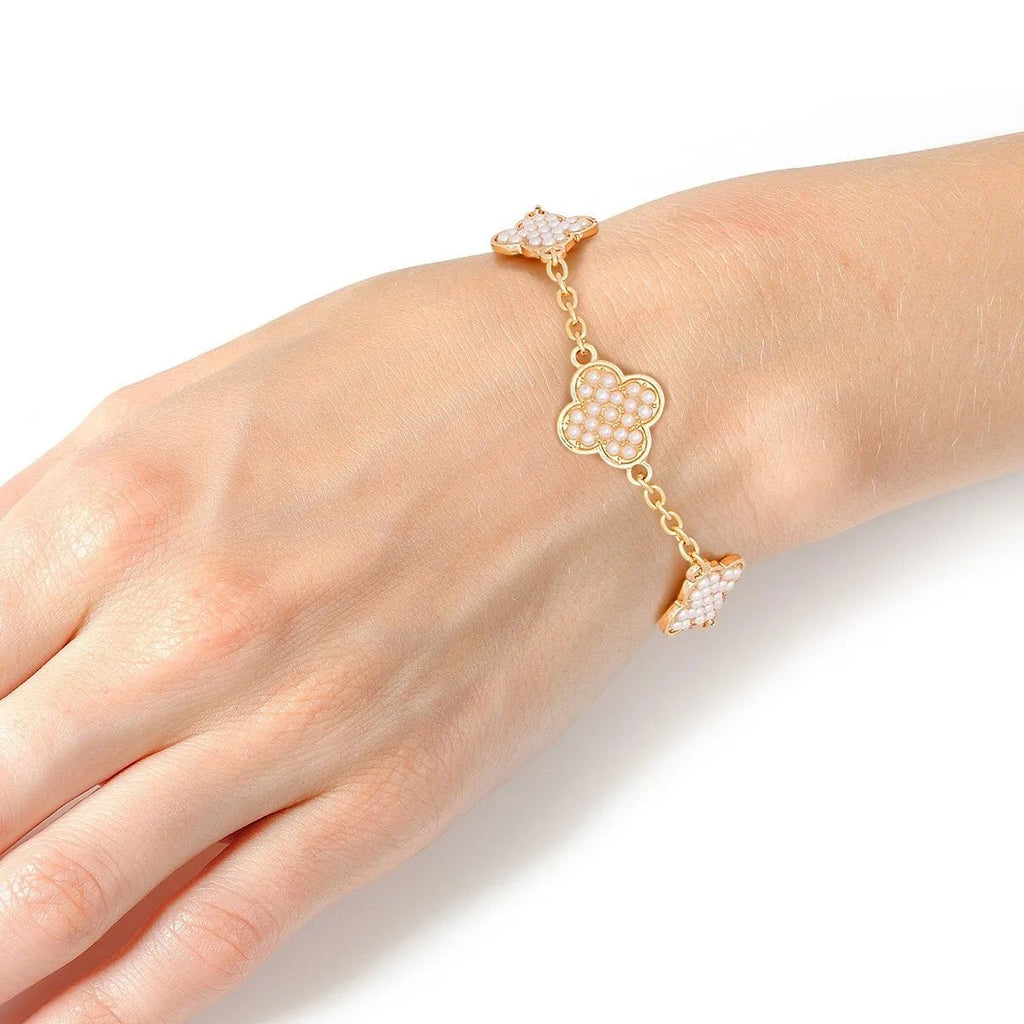 Timeless Grace: Pearl-Adorned Quatrefoil Chain Bracelet in Gold