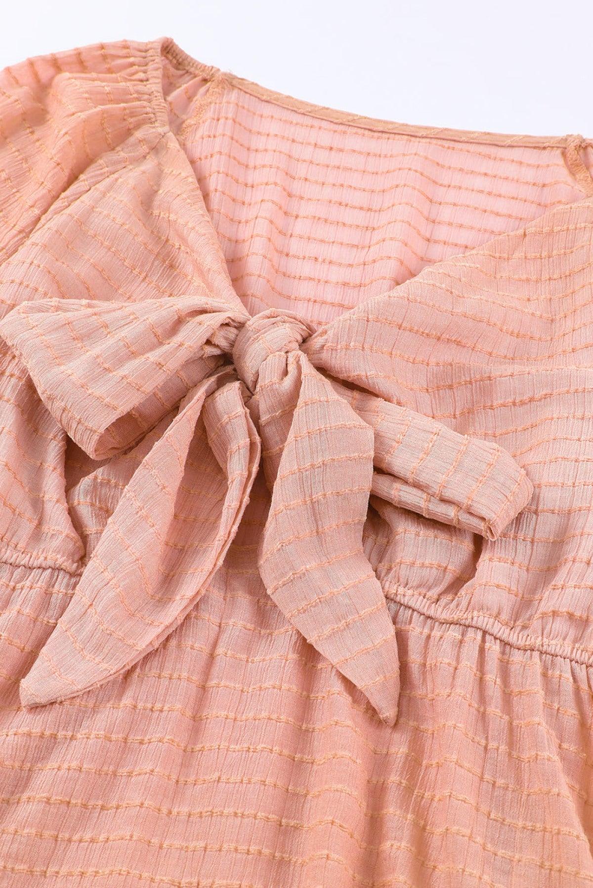 Pink Textured Tie Front Peplum Blouse