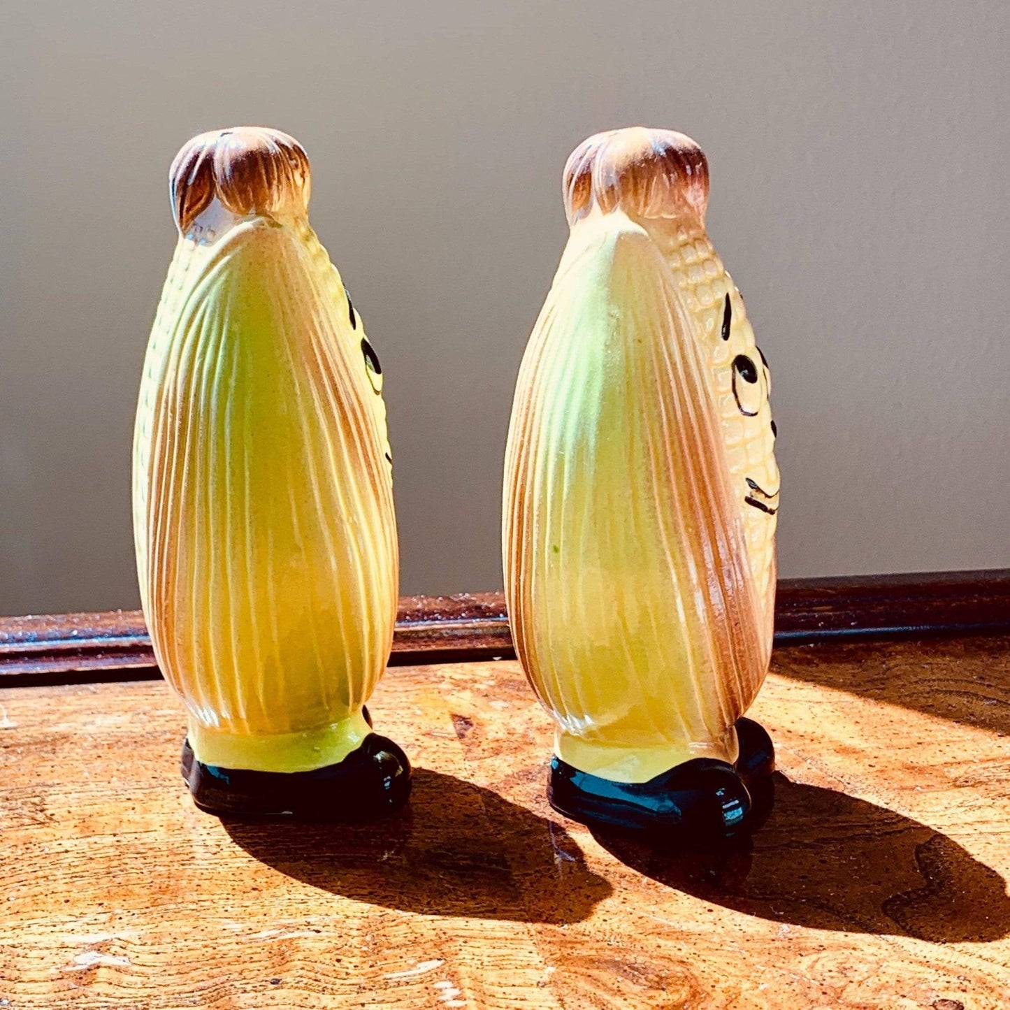 Vintage Ceramic Shakers Corn Cobs with Faces and Black Shoes