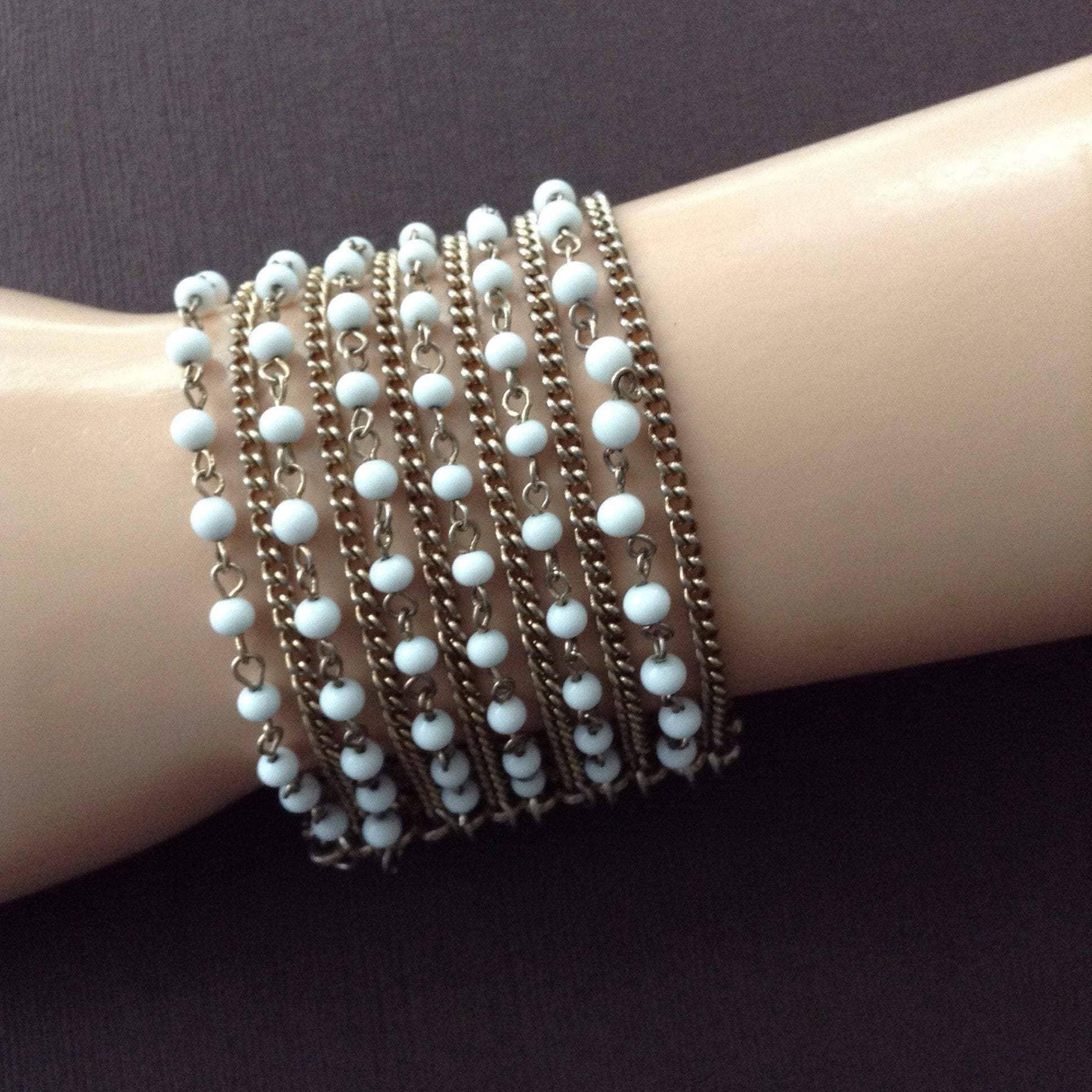 Women's multi strand gold-tone & white bead chain bracelet