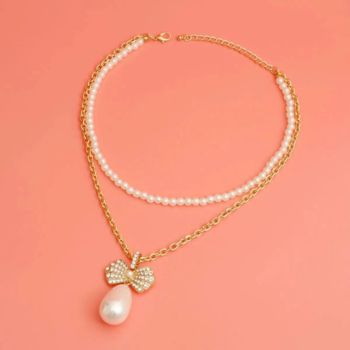 Elegant Gold Bow & Pearl Drop Pendant Necklace: Timeless Elegance for Every Occasion