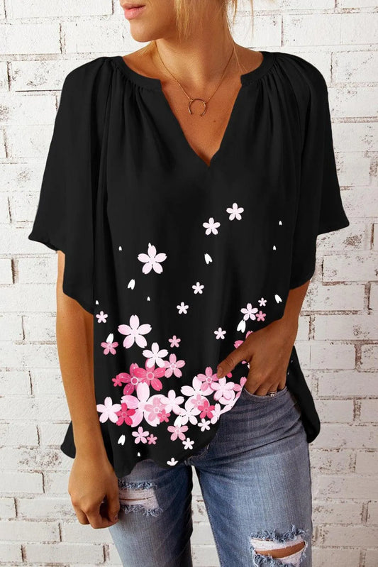 Embrace the Floral Trend with this Black Draped Top Jewelry Bubble