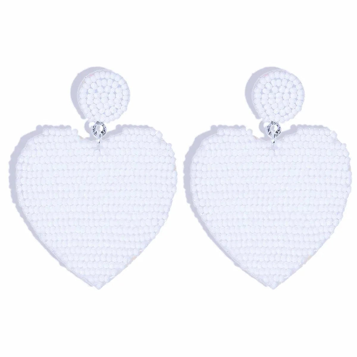 Feel the Love: White Heart Earrings for Every Style