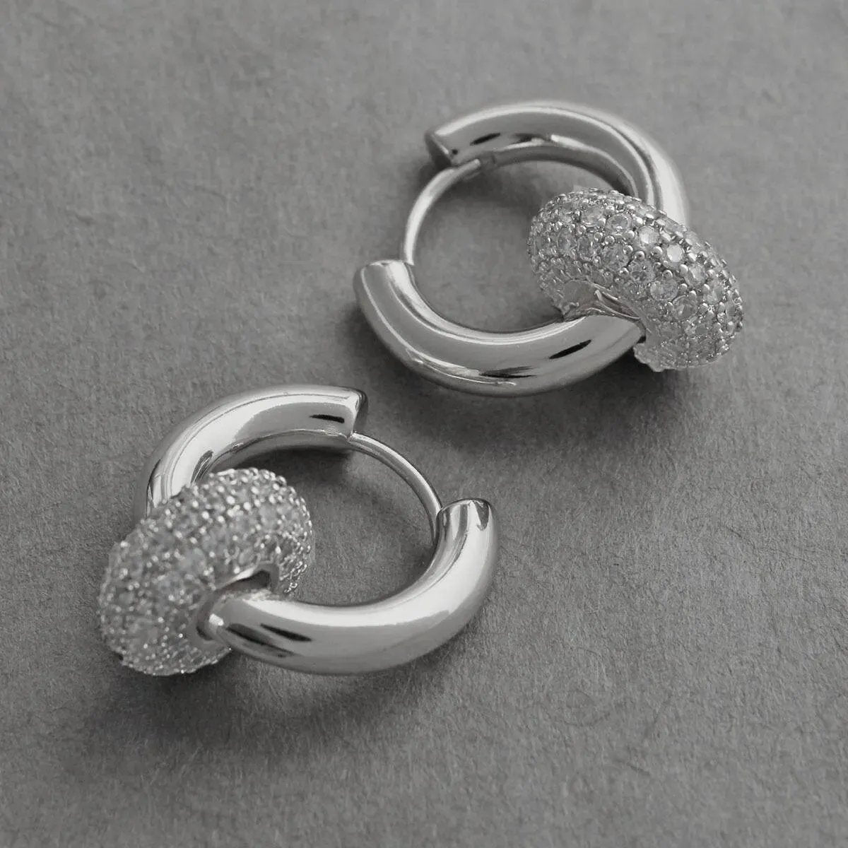 Get Glamorous: Explore Fashion Jewelry Essentials - White Gold Pave Ring and Huggie Hoop Earrings
